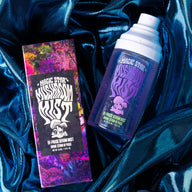 Mystical themed product with packaging and spray bottle on a blue satin background